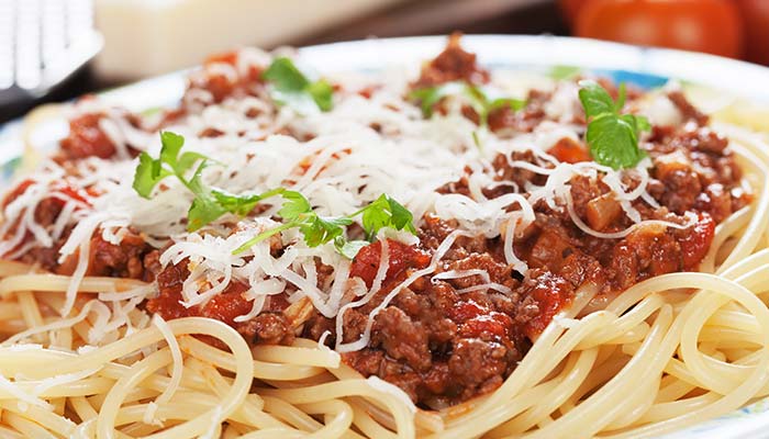 Spaghetti with meat sauce, cheese, and parsley—perfect for lunch in Wausau WI.